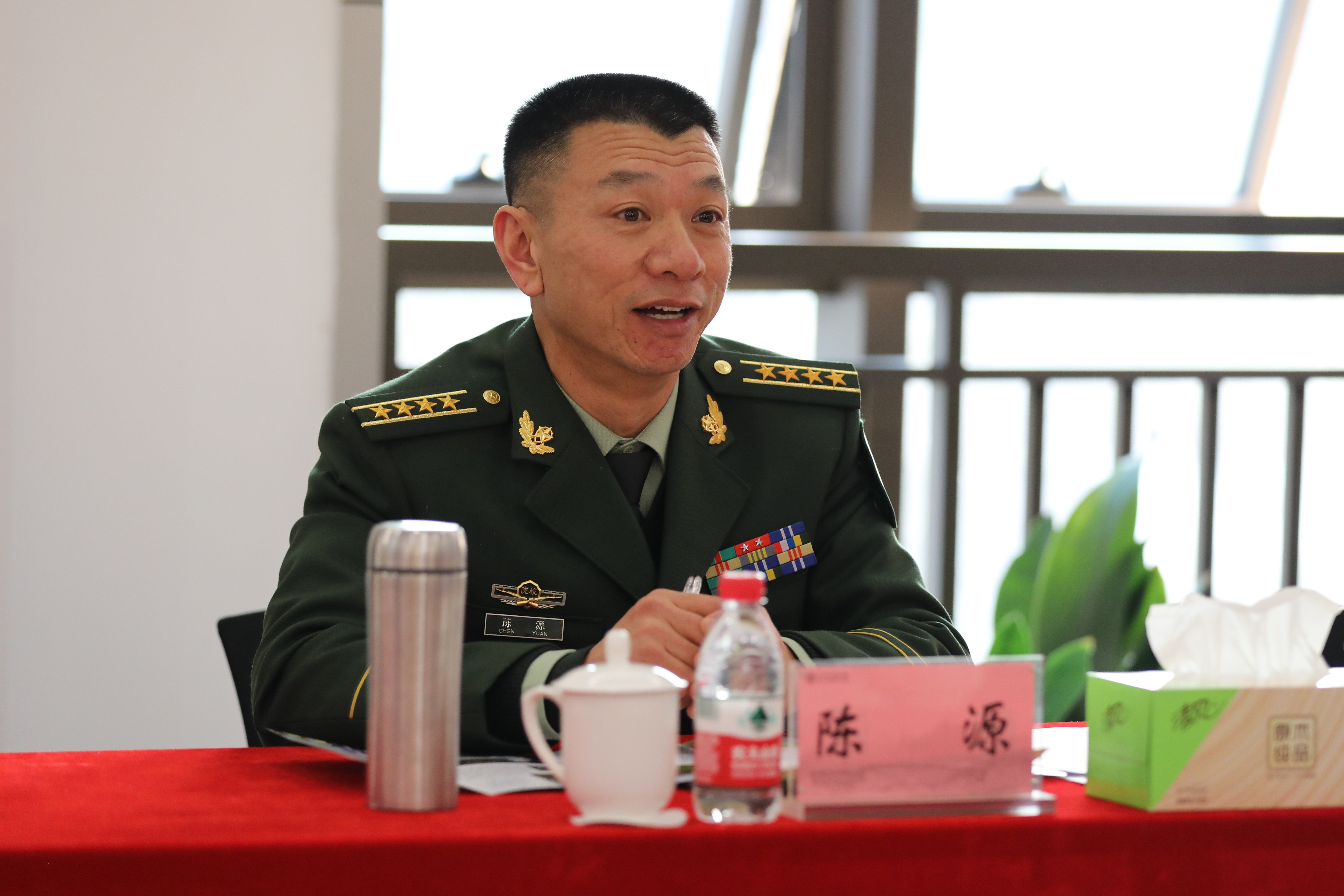 武警士官学校校长陈源一行来访我校